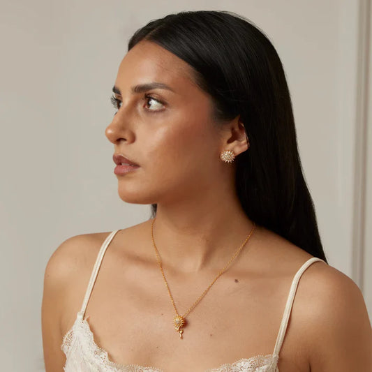 Aretes Girasol Giratorios Bañados en Oro