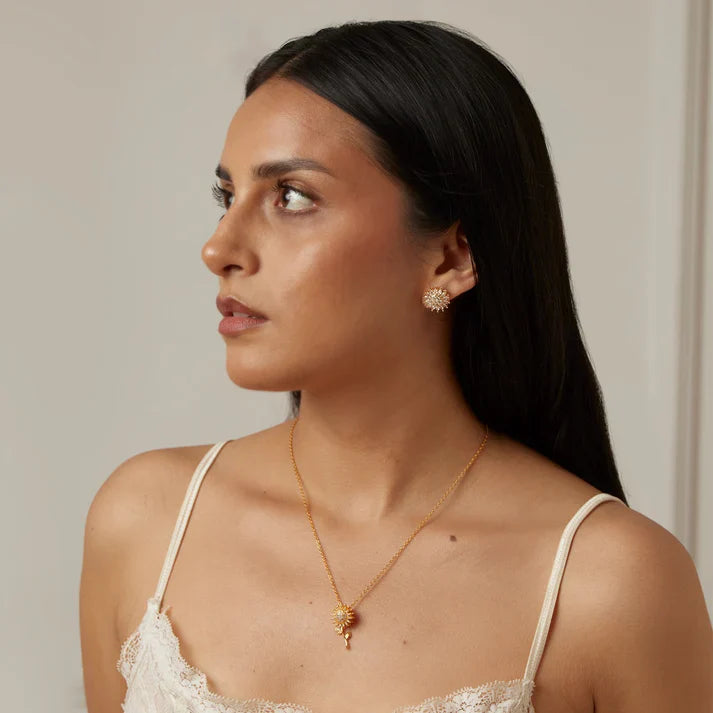 Aretes Girasol Giratorios Bañados en Oro